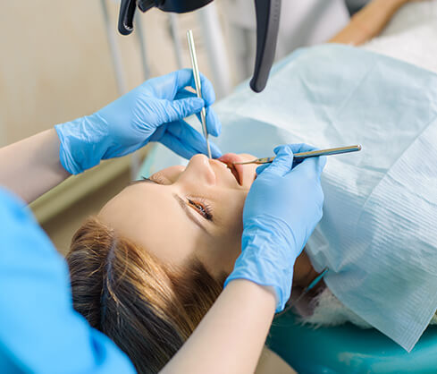 dental patient receiving an exam